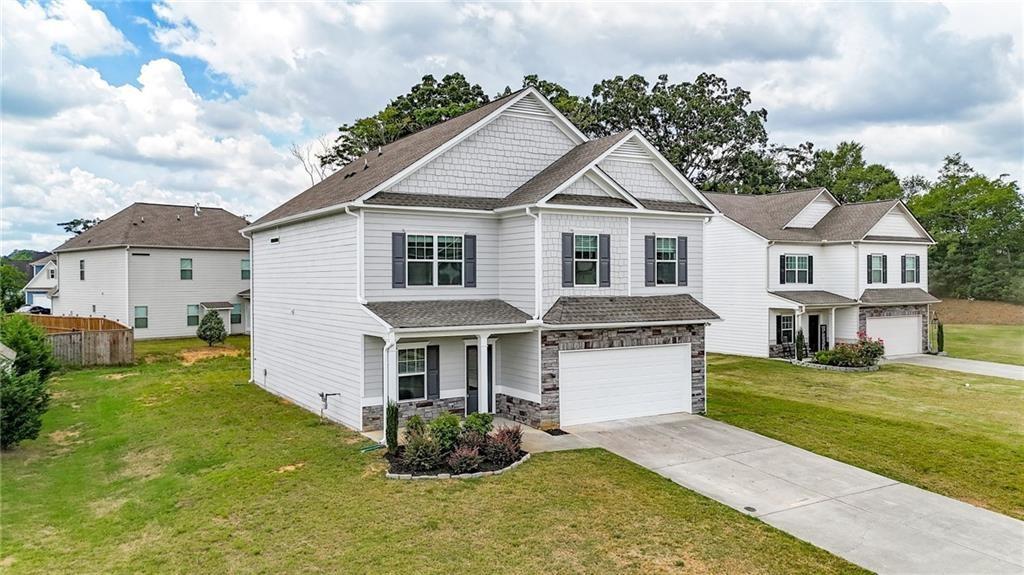 111 Weston Way Northwest Cartersville, GA 30121 - Photo 37 of 41 a front view of a house with a yard