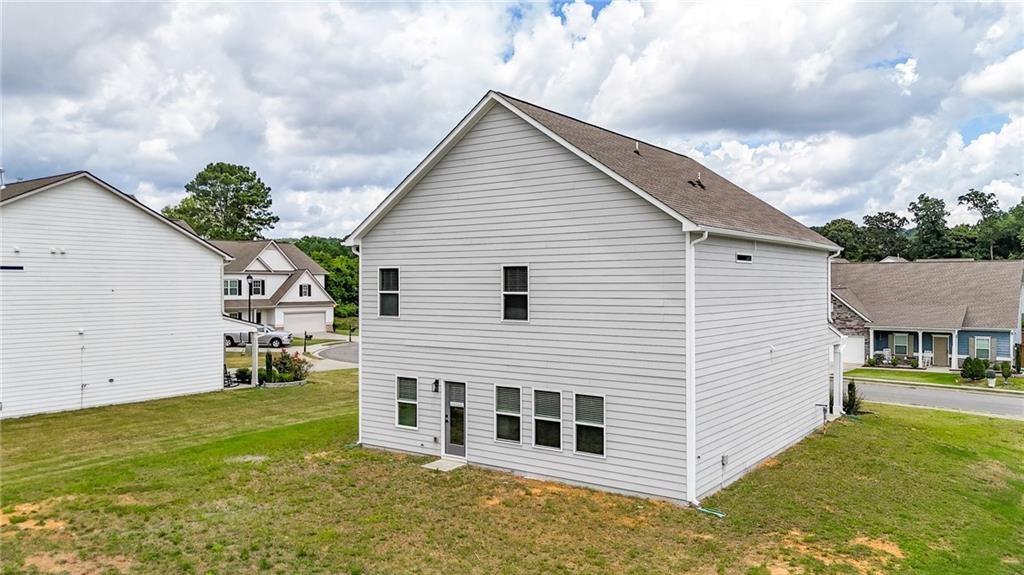 111 Weston Way Northwest Cartersville, GA 30121 - Photo 40 of 41 a view of a house with a yard
