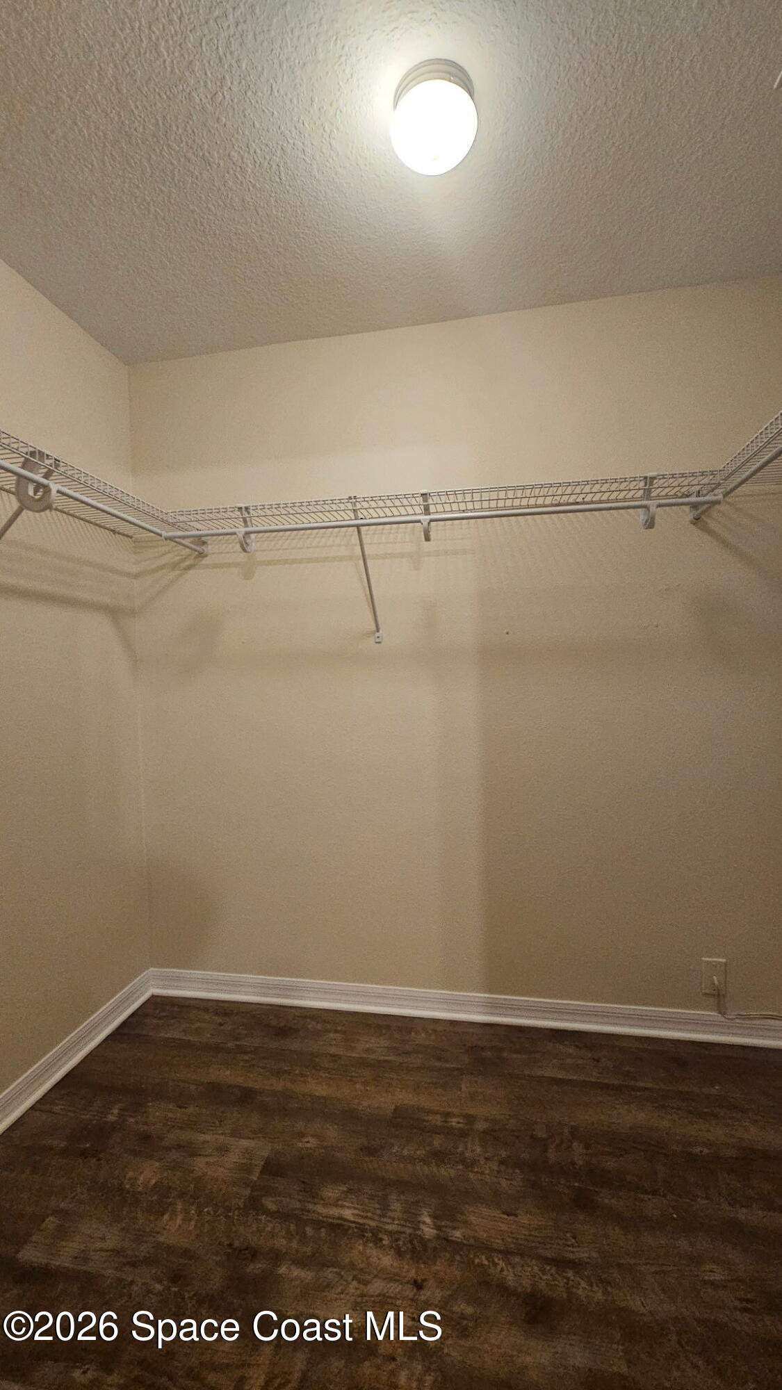 6150 Dees Road, Unit 6 Cocoa, FL 32927 - Photo 14 of 24 Walking closet of master bedroom