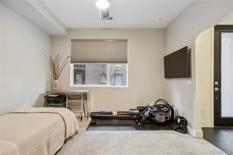 a bathroom with a toilet a sink and shower