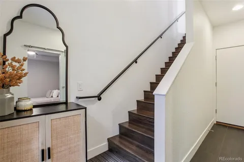 a view of a balcony with furniture