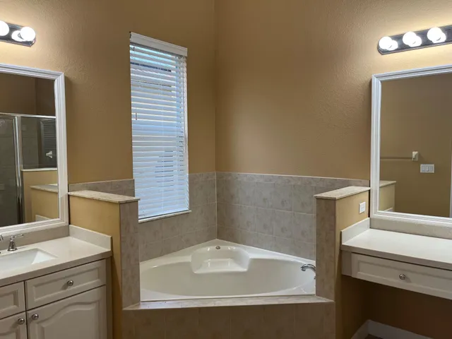 a bathroom with a sink and a bathtub