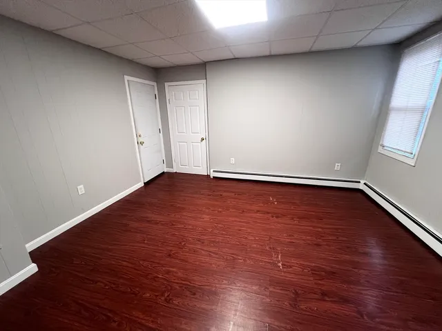 a view of room with hardwood floor