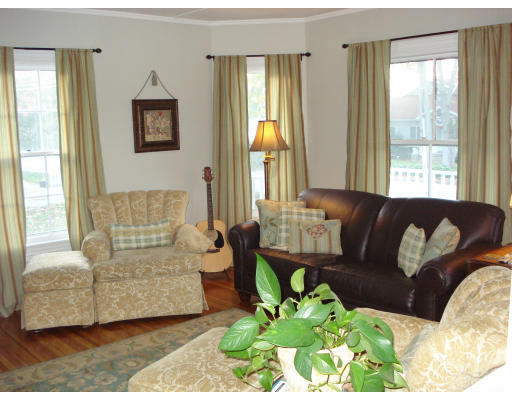 72 Turner Road Scituate, MA 02066 - Photo 3 of 10 a living room with furniture and a large window