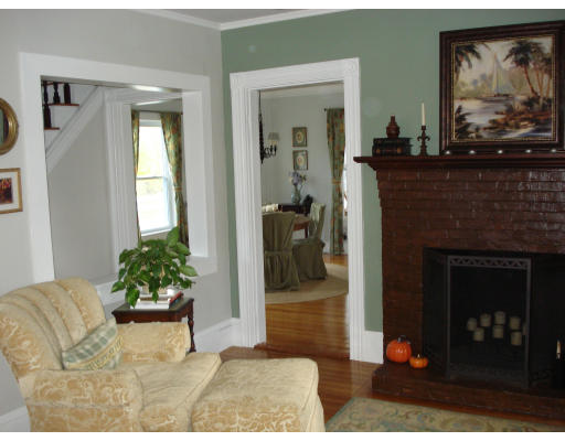 72 Turner Road Scituate, MA 02066 - Photo 7 of 10 a living room with furniture and a fireplace