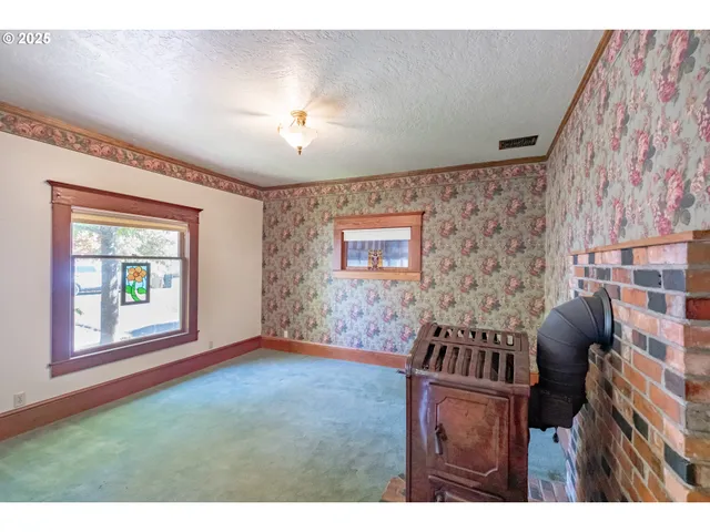 a view of an empty room and window