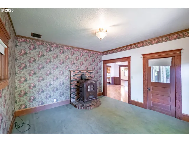 a view of livingroom with furniture and chandelier fan