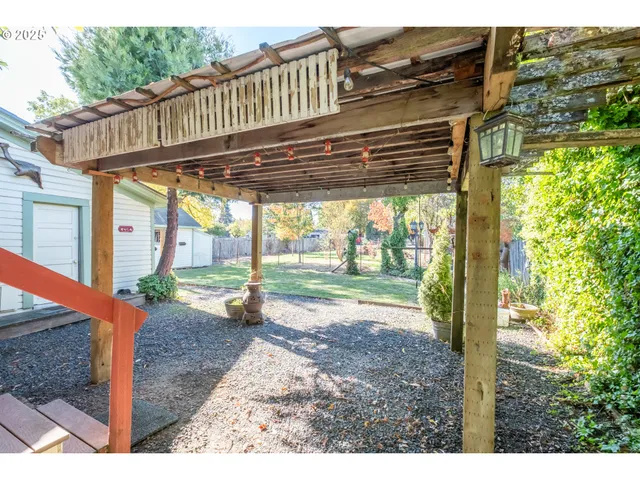 a backyard of a house with lots of green space