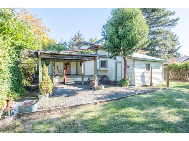 a backyard of a house with seating space