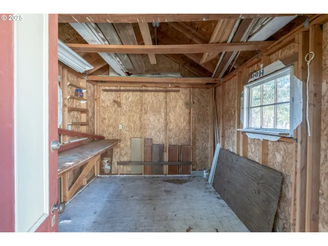a aerial view of a house with a yard