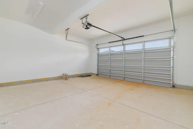a view of empty room with garage