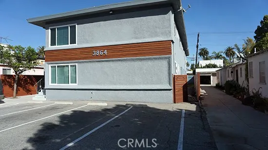 a front view of a house with a garage