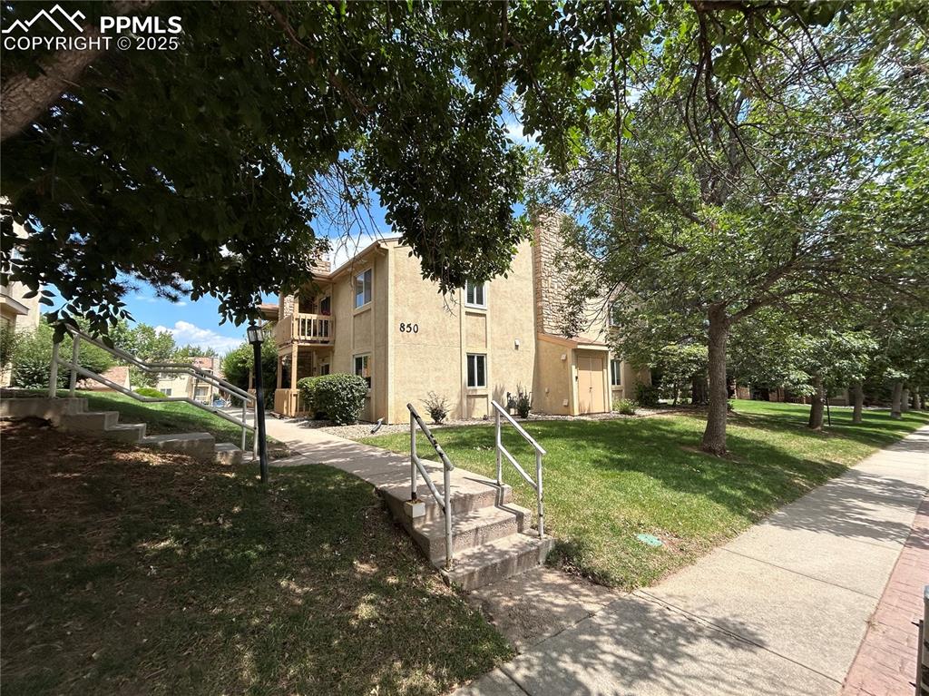 850 Tenderfoot Hill Road, Unit 103 Colorado Springs, CO 80906 - Photo 1 of 20 a view of a park with large trees