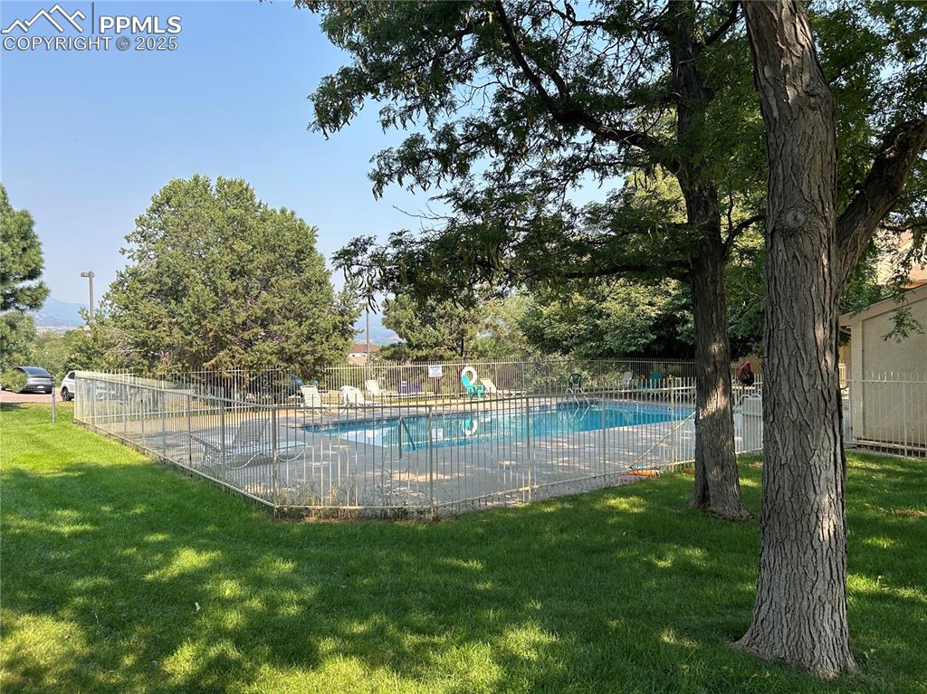 850 Tenderfoot Hill Road, Unit 103 Colorado Springs, CO 80906 - Photo 16 of 20 a view of a yard with large trees