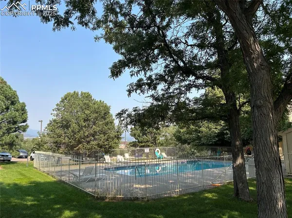 a view of a backyard of the house
