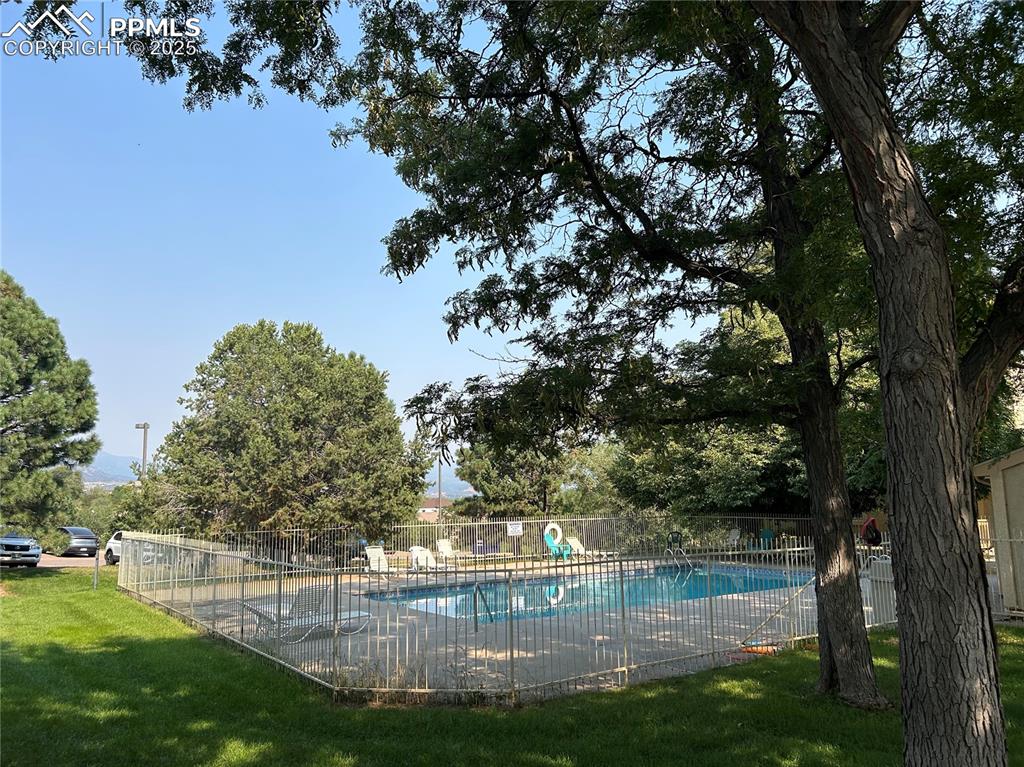850 Tenderfoot Hill Road, Unit 103 Colorado Springs, CO 80906 - Photo 4 of 20 a view of a backyard of the house