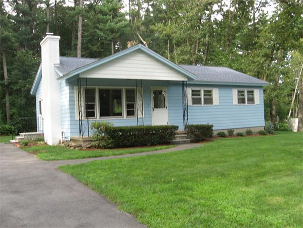 12 Westminster Road Billerica, MA 01821 - Photo 10 of 10 a front view of a house with a yard and garage