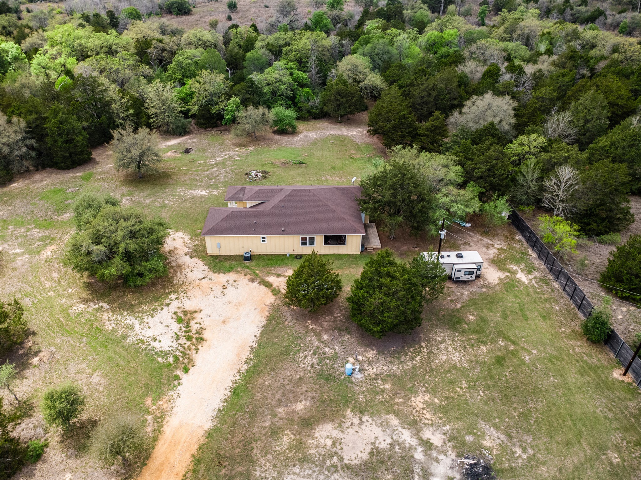 1354 Old Pin Oak Road Paige, TX 78659 - Photo 29 of 37 an aerial view of residential houses with outdoor space