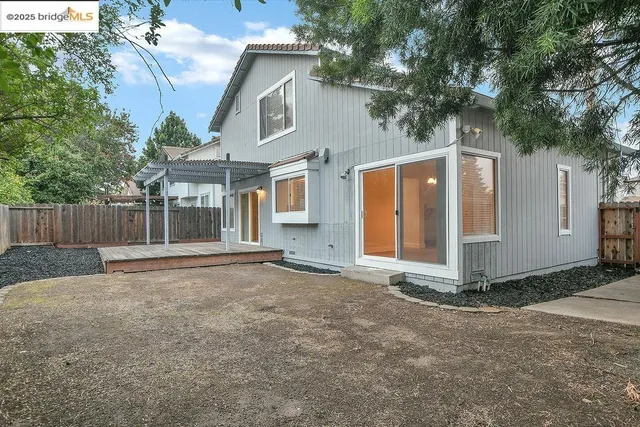 a view of outdoor space with wooden fence