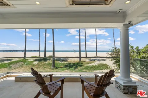 a view of a kitchen with a sink and cabinets