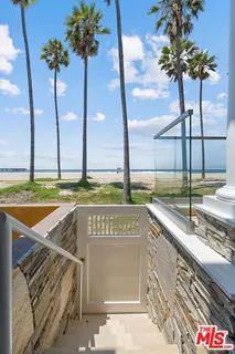 a bathroom with a sink vanity and toilet