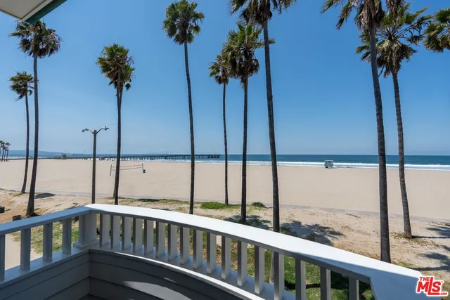 a bathroom with a double vanity sink toilet mirror and bathtub