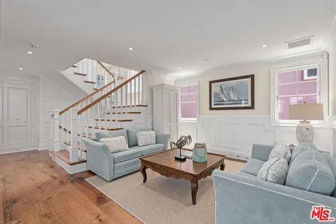 a kitchen with granite countertop a sink and a window