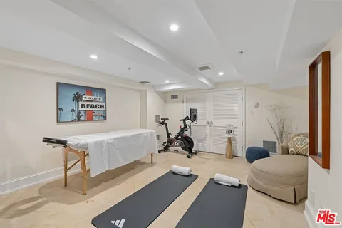 a bathroom with double sink and a mirror