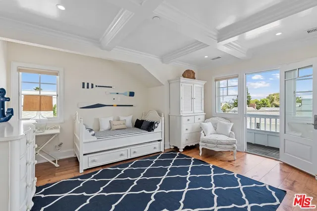 a view of a storage and utility room with washer and dryer