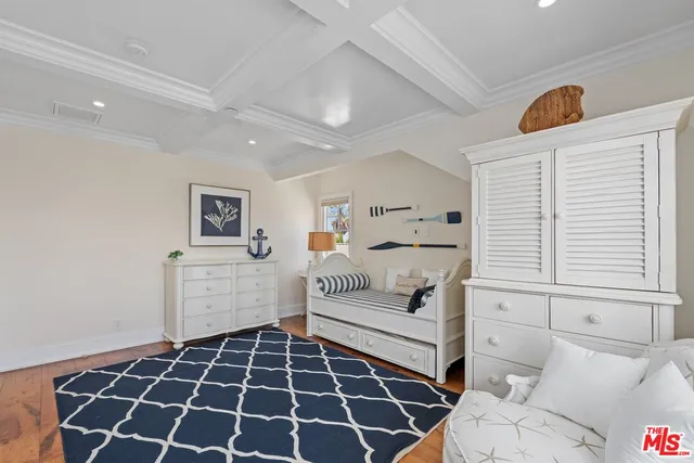 a front view of multiple houses with a yard