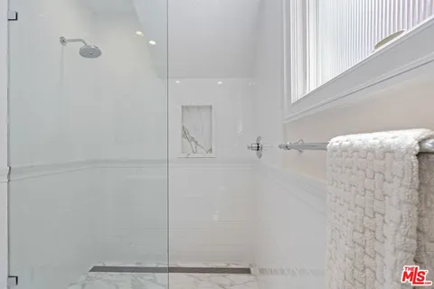 a view of a dinning table and chairs in the patio