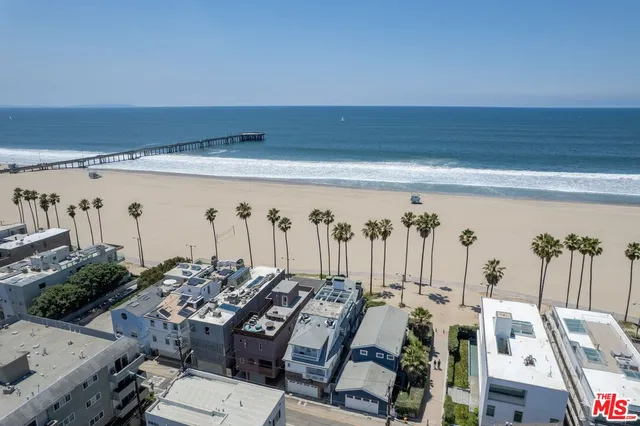 a picture of a wall with a white wall and a picture of a gate
