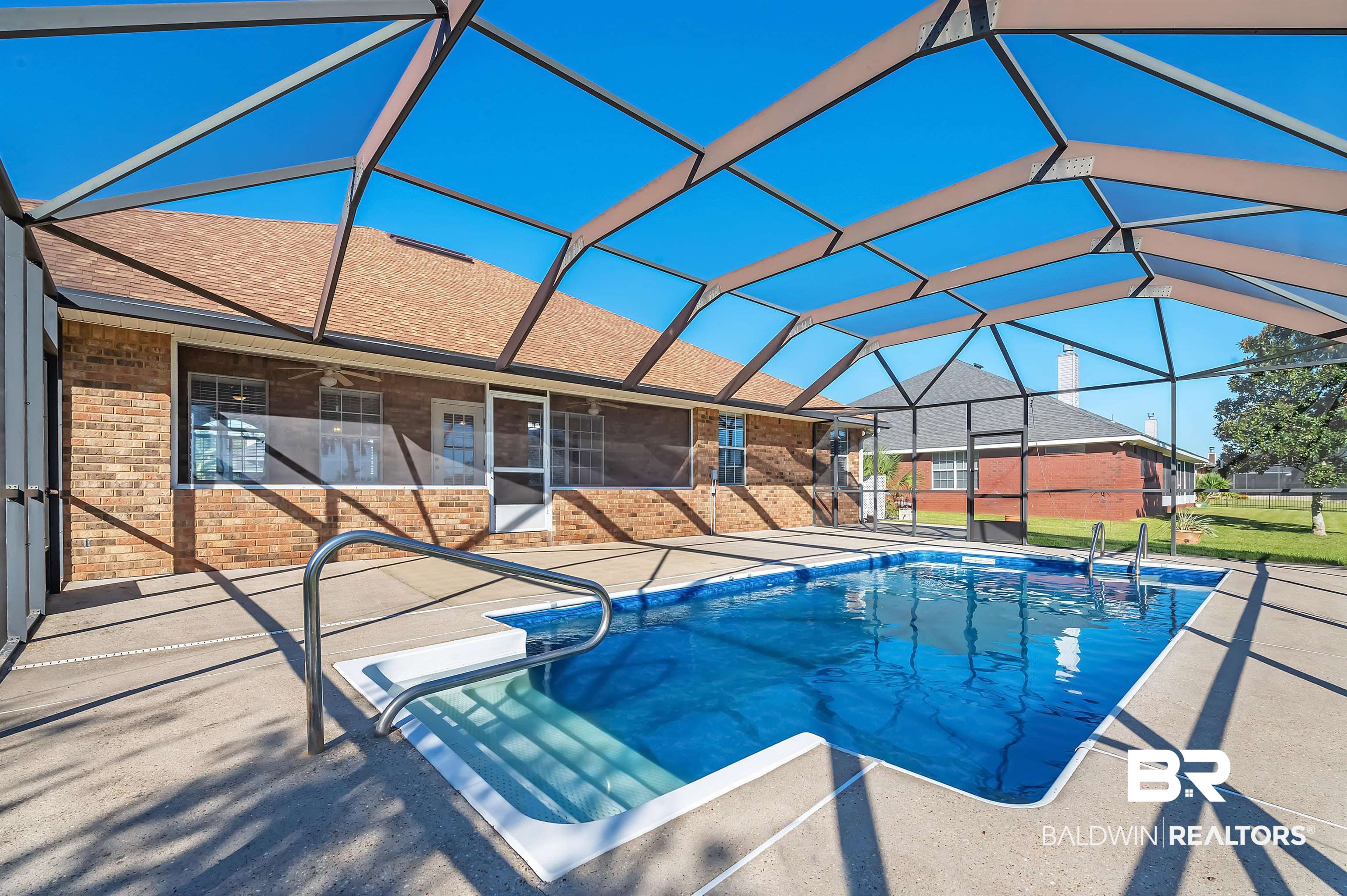 421 Collinwood Loop Foley, AL 36535 - Photo 15 of 62 View of pool with a patio area and a lanai