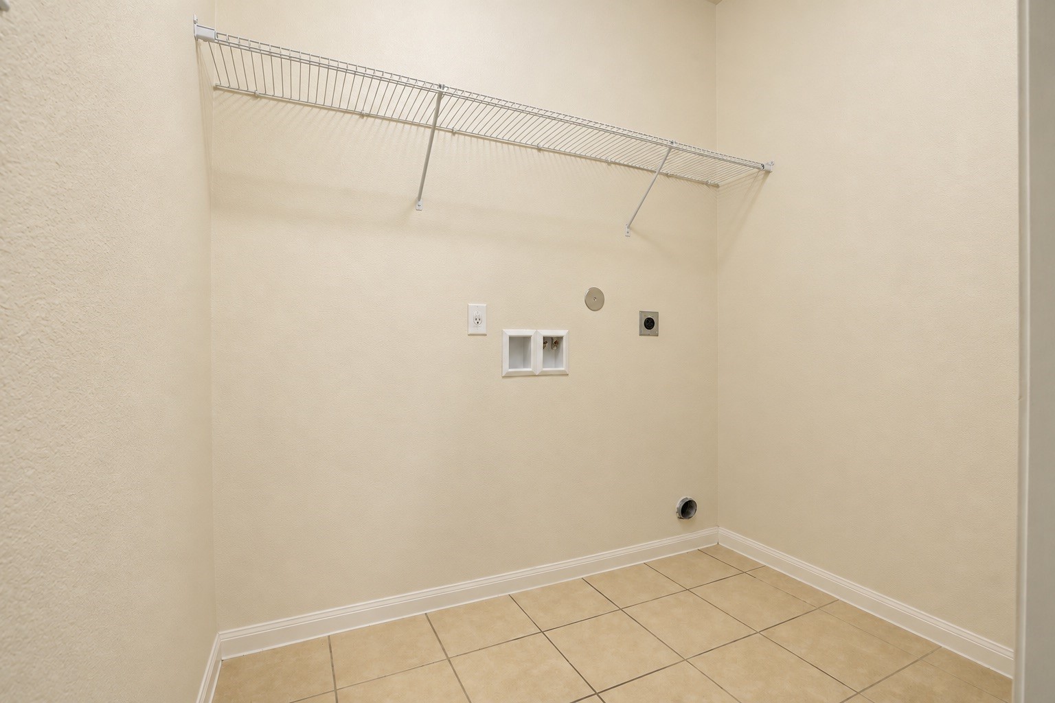 1634 Pink Stone Drive Rosharon, TX 77583 - Photo 14 of 38 Enjoy having the laundry room close to the secondary rooms, this home has plenty of storage closets as well!