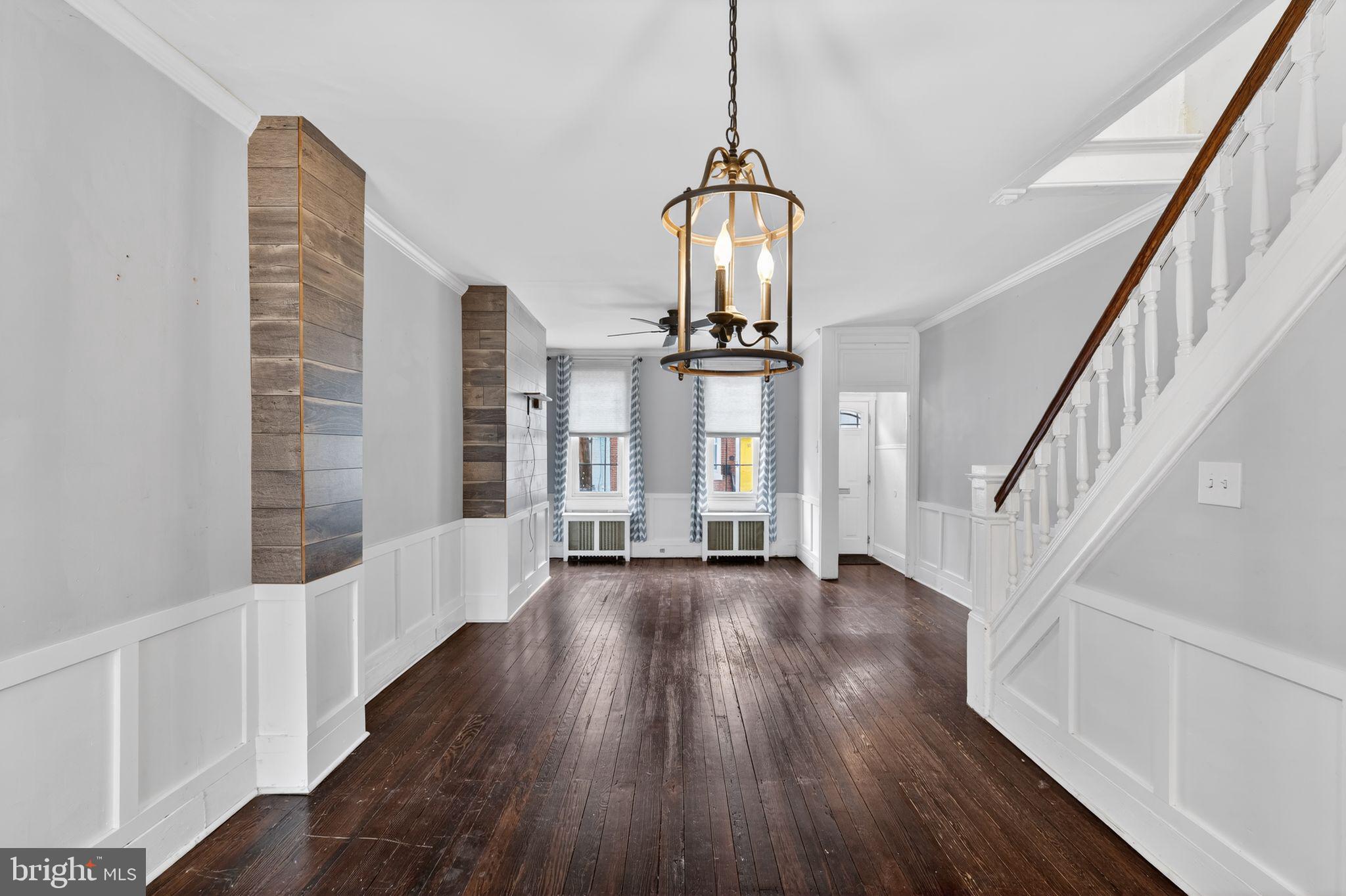 137 Davis Street Philadelphia, PA 19127 - Photo 5 of 17 a view of a room with wooden floor and staircase