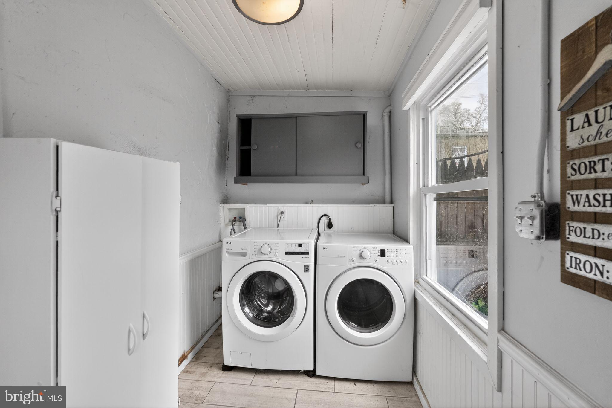 137 Davis Street Philadelphia, PA 19127 - Photo 6 of 17 a utility room with dryer and washer