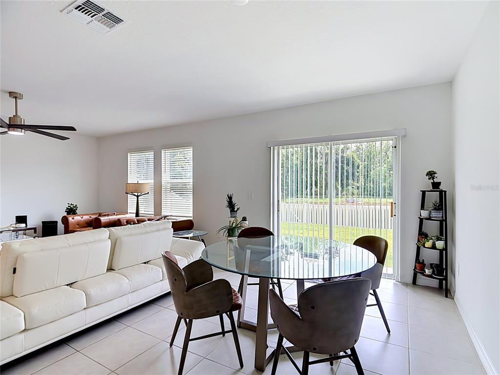 1633 Red Loop Lakeland, FL 33801 - Photo 10 of 60 a living room with furniture and a large window