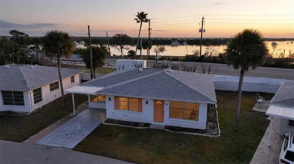 a aerial view of a house with a garden