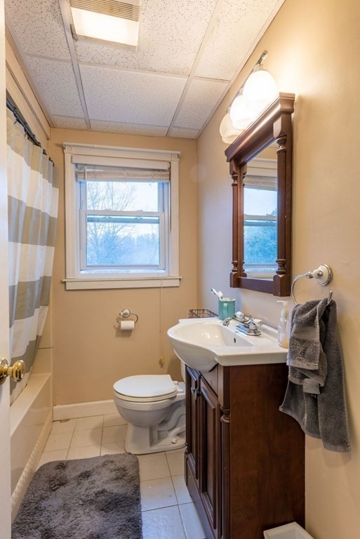 320 Pelham Road Amherst, MA 01002 - Photo 16 of 23 a bathroom with a sink toilet and a mirror