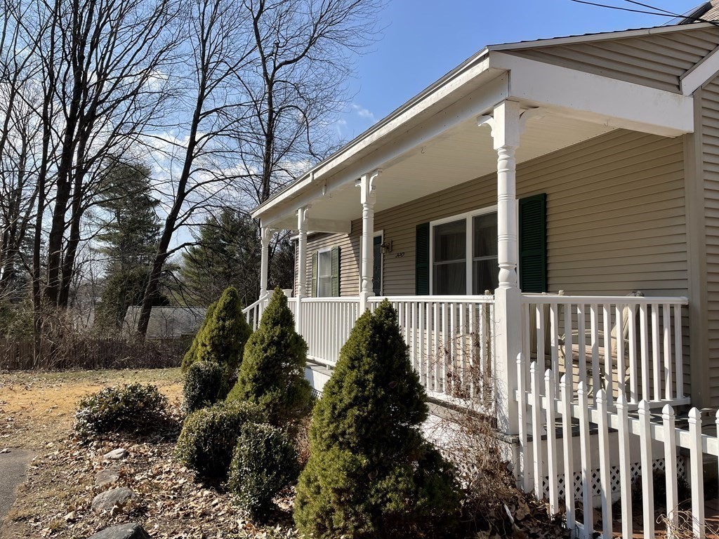 320 Pelham Road Amherst, MA 01002 - Photo 2 of 23 a view of a house with a yard
