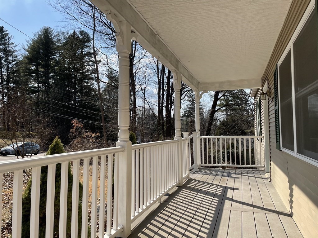 320 Pelham Road Amherst, MA 01002 - Photo 3 of 23 a view of a balcony with wooden floor