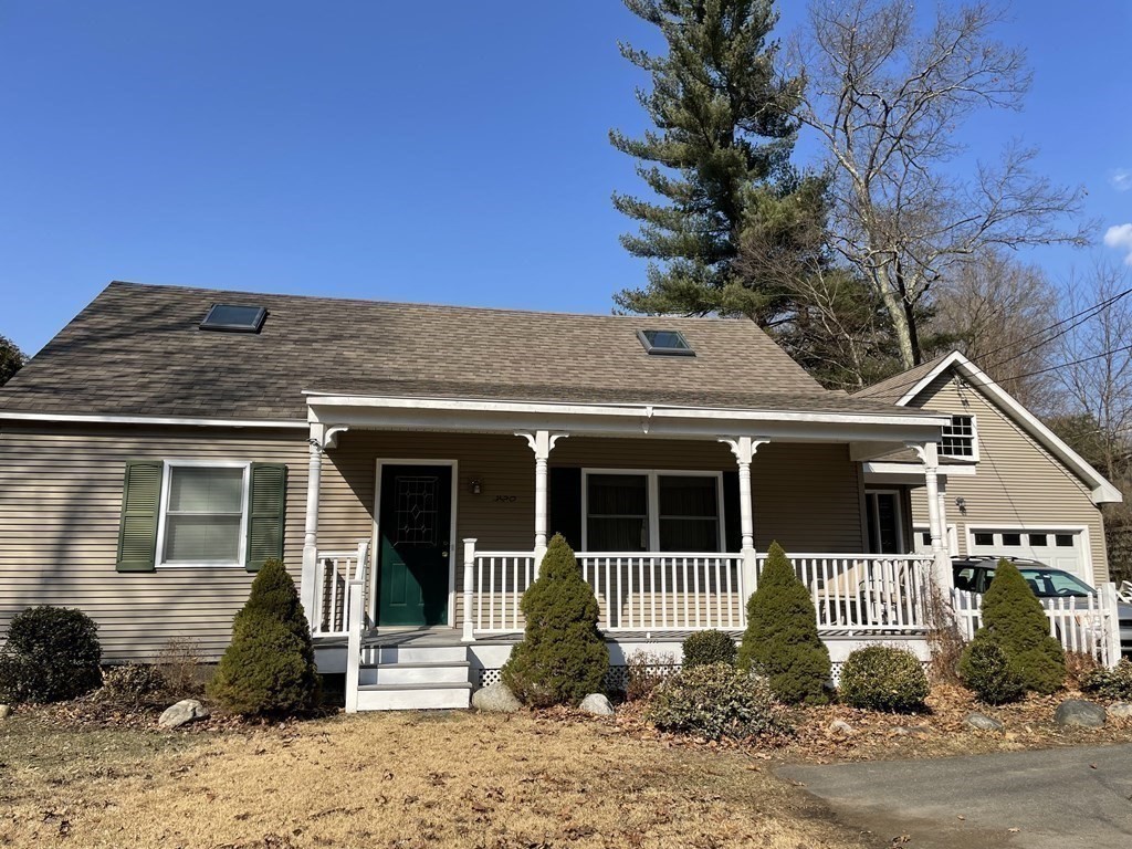 320 Pelham Road Amherst, MA 01002 - Photo 4 of 23 a front view of a house with a yard