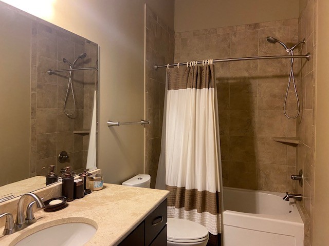 804 North Thompson Lane, Unit 2H Murfreesboro, TN 37129 - Photo 6 of 6 a bathroom with a granite countertop sink toilet and shower
