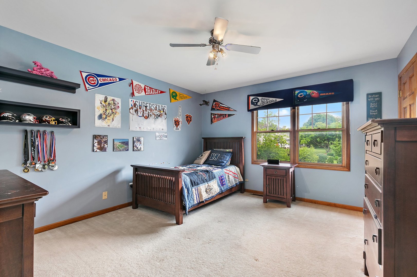 655 Red Maple Lane Roselle, IL 60172 - Photo 20 of 40 a bedroom with furniture and a window