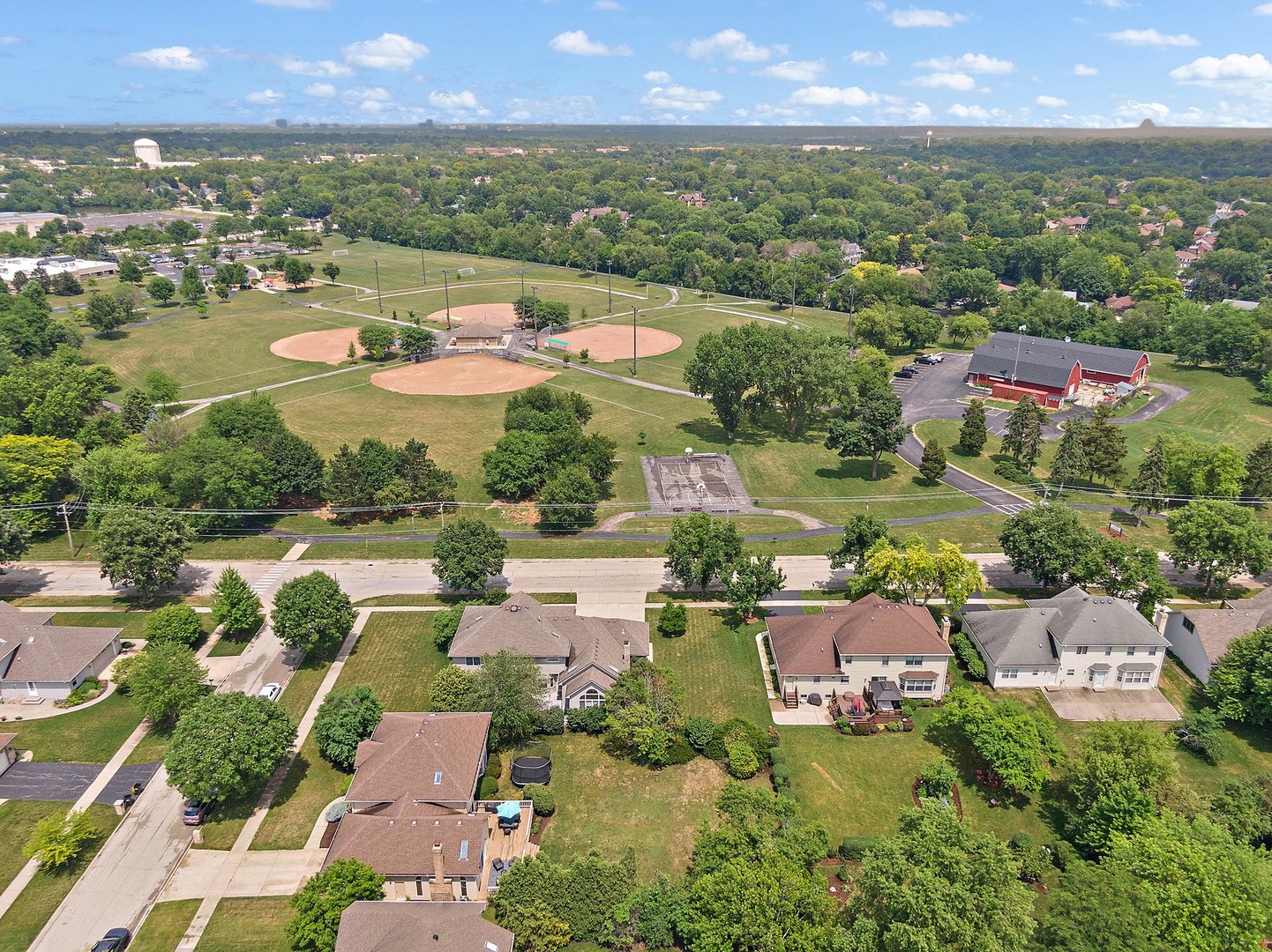 655 Red Maple Lane Roselle, IL 60172 - Photo 36 of 40 an aerial view of house with yard swimming pool and outdoor seating