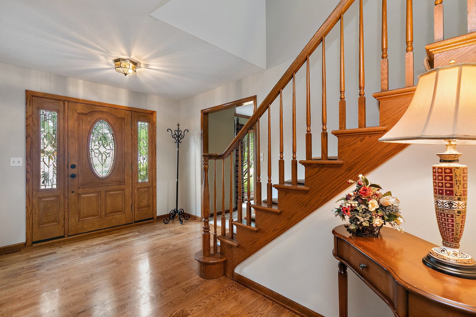 655 Red Maple Lane Roselle, IL 60172 - Photo 4 of 40 a view of entryway with wooden floor