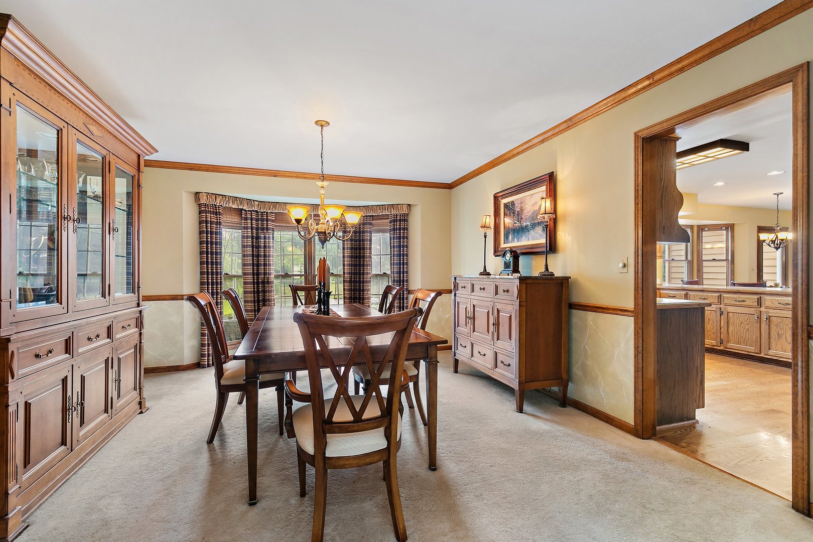 655 Red Maple Lane Roselle, IL 60172 - Photo 6 of 40 a view of a dining room with furniture window and outside view