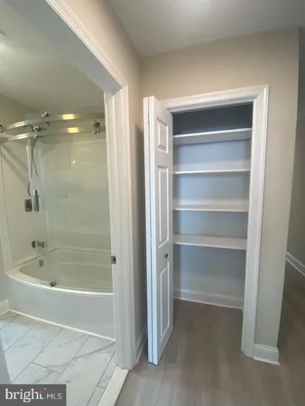 a bathroom with a bathtub