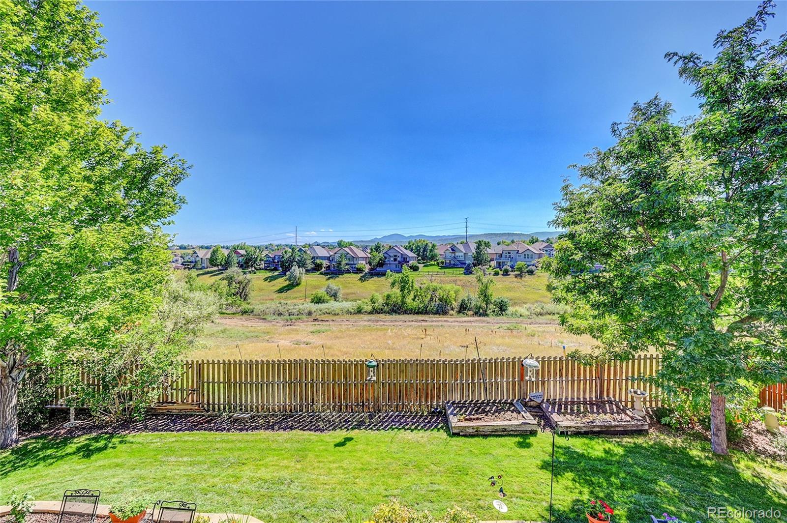 11232 West Cooper Drive Littleton, CO 80127 - Photo 39 of 48 a view of a garden with an outdoor space