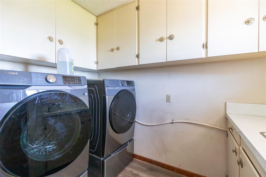 36 Poverty Point Circle Abilene, TX 79601 - Photo 20 of 31 a utility room with dryer and washer